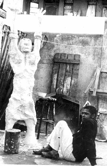 DUMILE in Durban, 1966, with one of his sculptures in Plaster of Paris