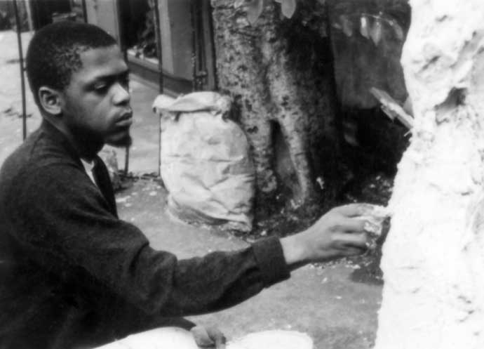 Dumile Feni working on one of his Plaster of Paris sculptures in 1966